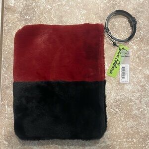 Sam Edelman, Mavis organizer clutch, cranberry and black, $35
